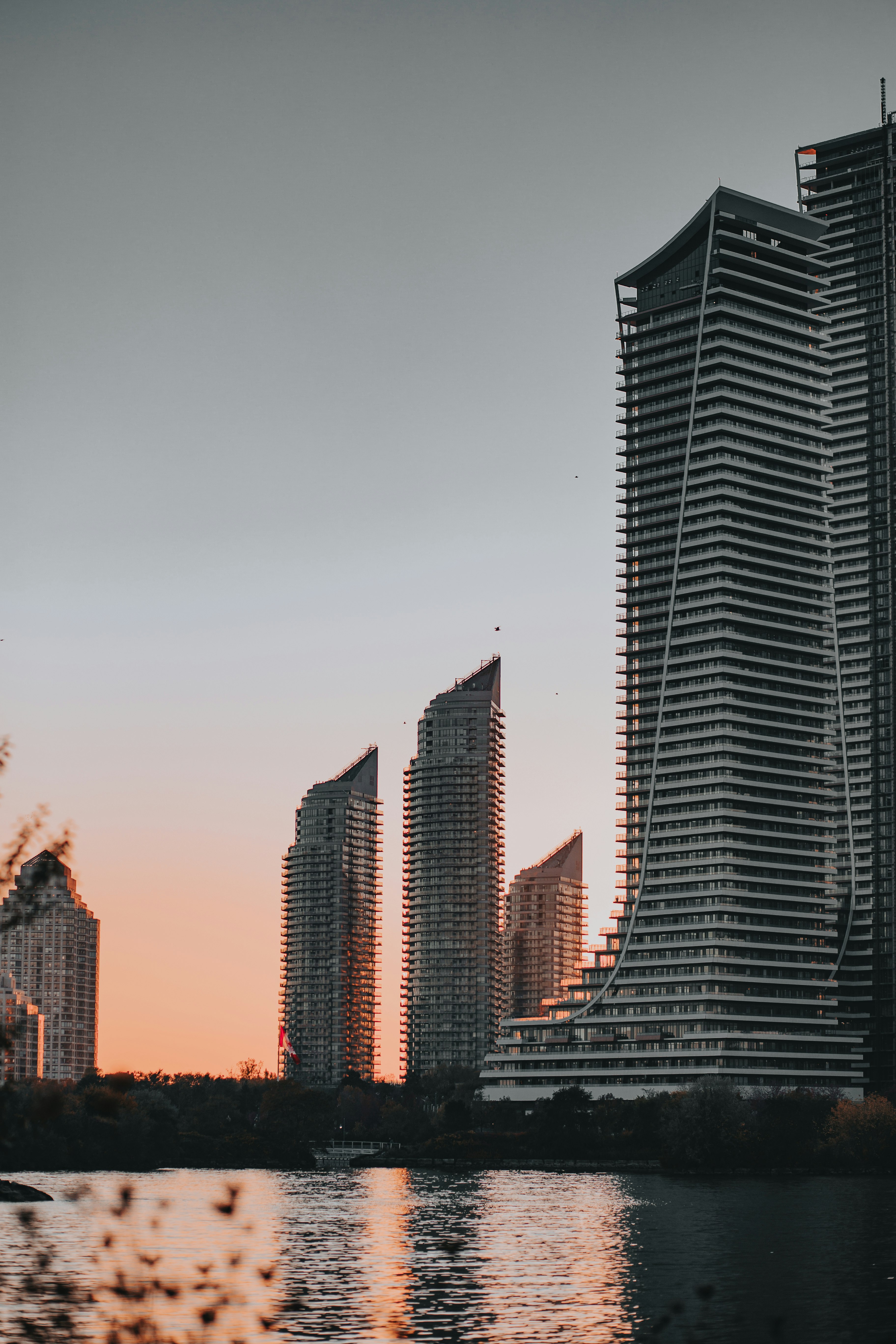 high rise buildings during sunset